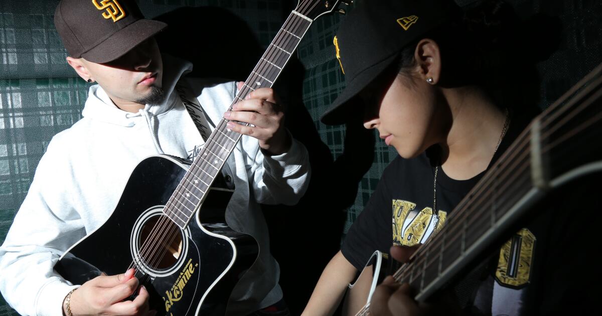 LOS ANGELES, CA - APRIL, 18, 2022: Mando and Yahritza Martinez hanging out at SoHo Warehouse in Downtown, Los Angeles on April 18th, 2022. The trio, led by Yahritza, age 15, have a band called Yahritza Y Sue Esencia, whose song, Soy El Unico recently went viral, shooting them to the No. 1 Spot of the Hot Latin Songs Billboard Chart.