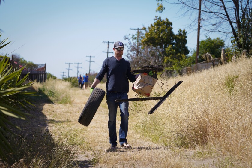 Chris Rice from La Jolla collected a discarded automobile tire and a portion of a mattress box spring