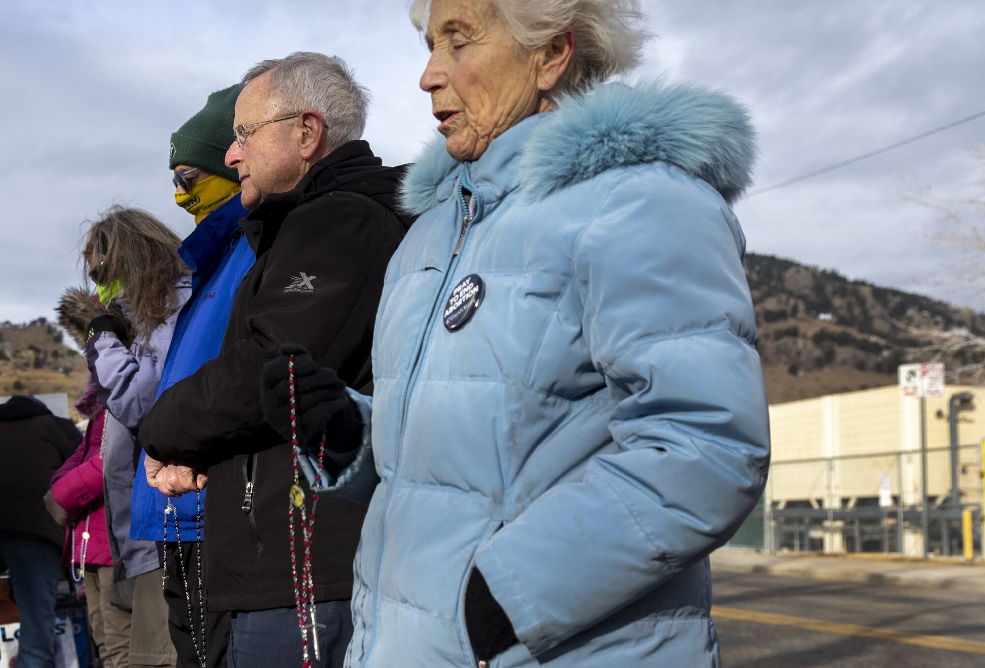 Antiabortion protesters hold rosaries and pray