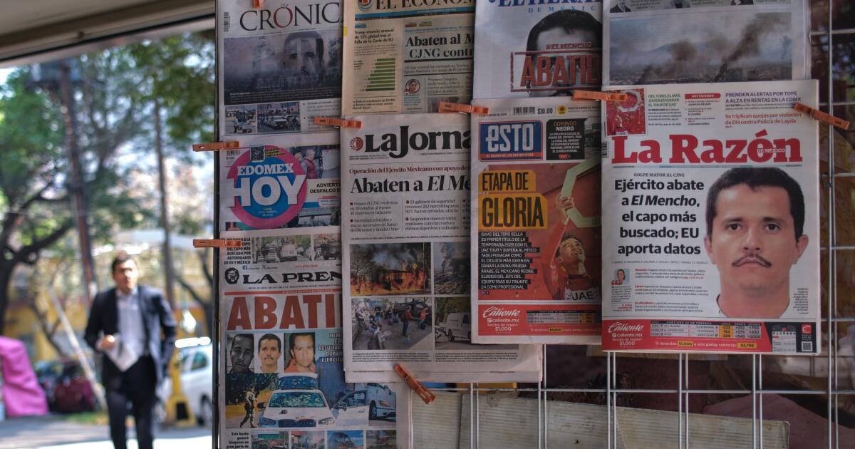 Newspapers hang on display for sale in Mexico City, Monday, Feb. 23, 2026, a day after the Mexican army killed Jalisco New Generation Cartel leader Nemesio Oseguera Cervantes, known as