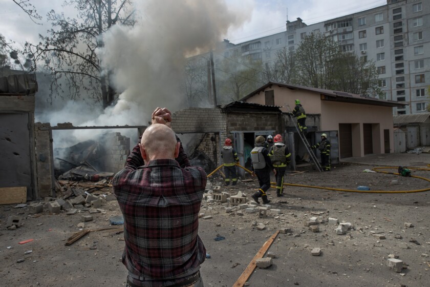 A resident of the area reacts after a Russian attack on a residential area in Kharkov, in northeastern Ukraine.