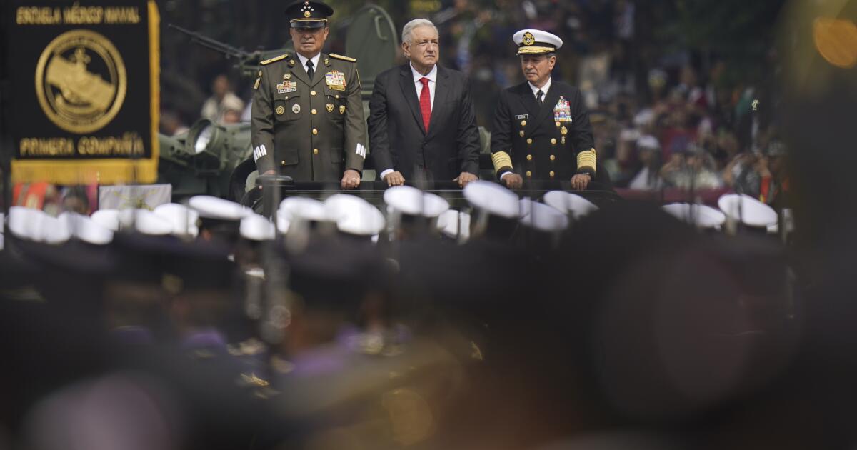Mexican President Andrés Manuel López Obrador, center, rides with Defense Secretary Luis Cresencio Sandoval, left, and Navy Secretary Rafael Ojeda Durán to review the troops before the start of the annual Independence Day parade in the main square, the Zocalo, in Mexico City, Monday, Sept. 16, 2024. (AP Photo/Felix Marquez)