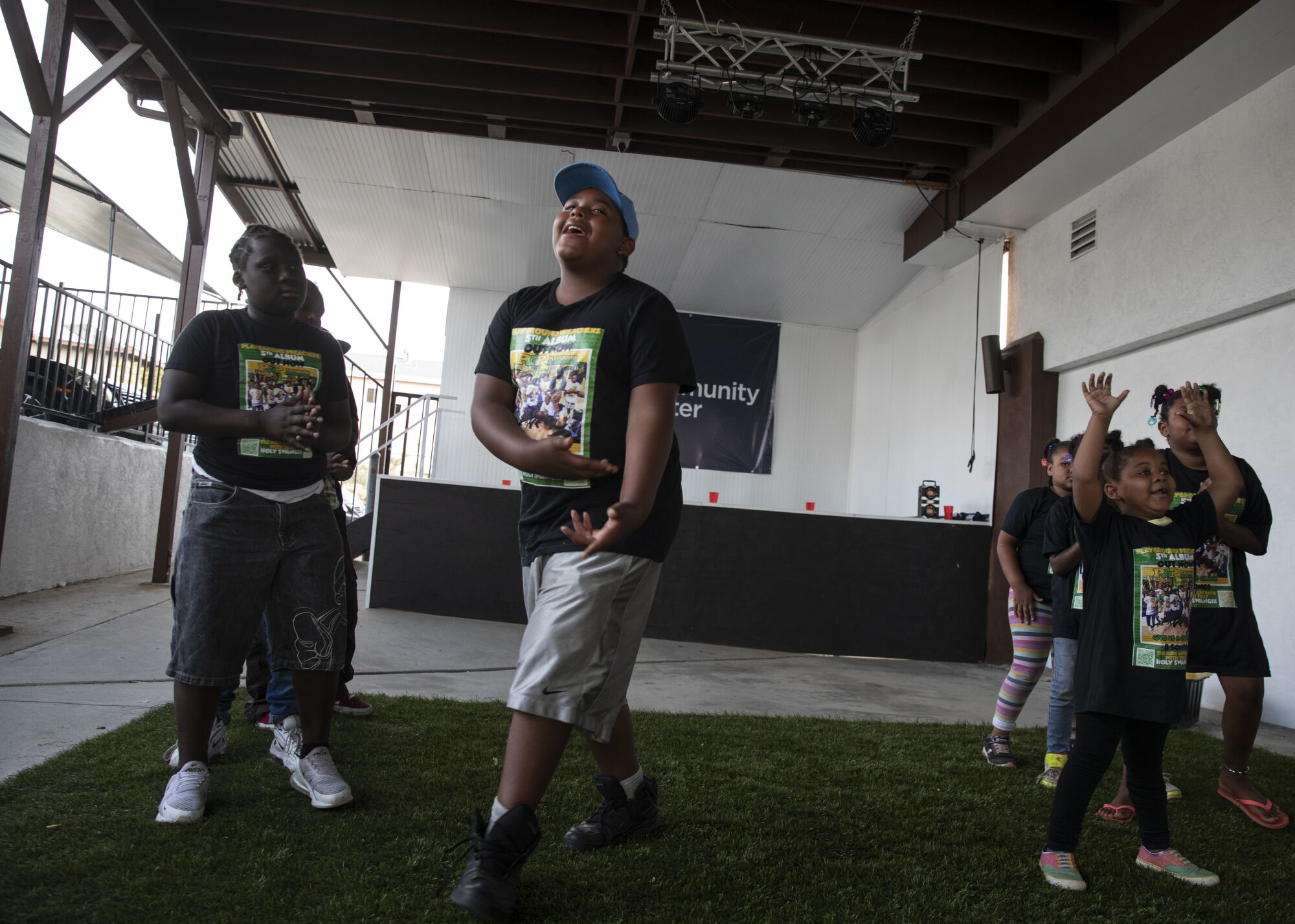 Ryan Murray, 11, sings during hip-hop practice.