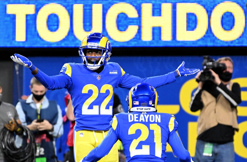 Rams cornerbacks David Long Jr. celebrates his interception for a touchdown against the Cardinals