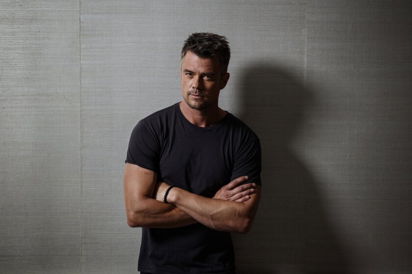 Josh Duhamel  - 2024 Dark brown hair & spikey hair style.
