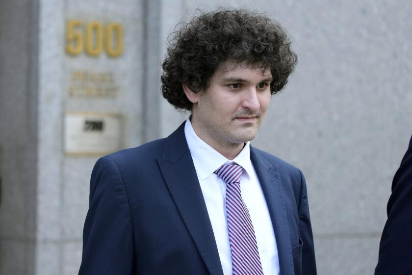 FILE - FTX founder Sam Bankman-Fried leaves Federal court on July 26, 2023, in New York. The former crypto mogul faces the potential of decades in prison when he is sentenced Thursday, March 28, 2024, for his role in the 2022 collapse of FTX, once one of the world's most popular platforms for trading digital currency. (AP Photo/Mary Altaffer, File)