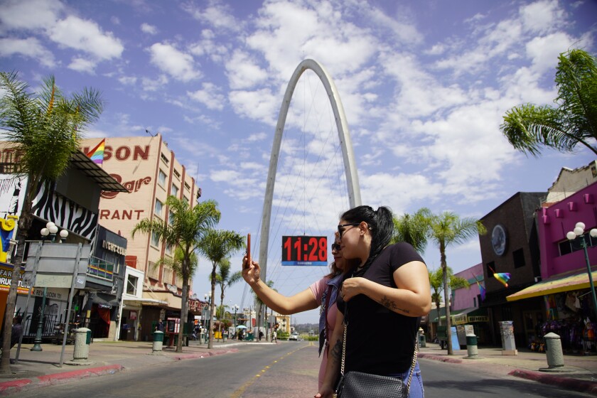 A group of tourists from Guadalajara take advantage of the empty streets for some photos.