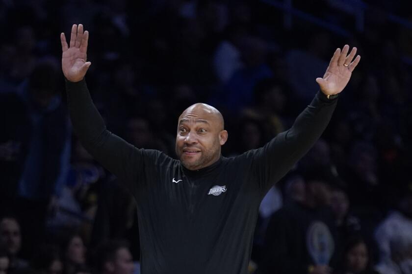 Los Angeles Lakers head coach Darvin Ham gestures during the first half of an NBA basketball game against the Utah Jazz Friday, Nov. 4, 2022, in Los Angeles. (AP Photo/Marcio Jose Sanchez)