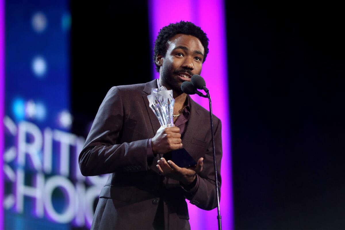 Donald Glover accepts the best actor in a comedy series award for "Atlanta" at the Critics' Choice Awards.