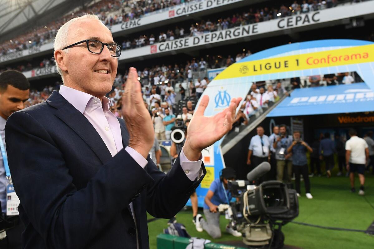 Marseille owner Frank McCourt attends his team's match against Toulouse on Aug. 10, 2018, at the Velodrome stadium in France.