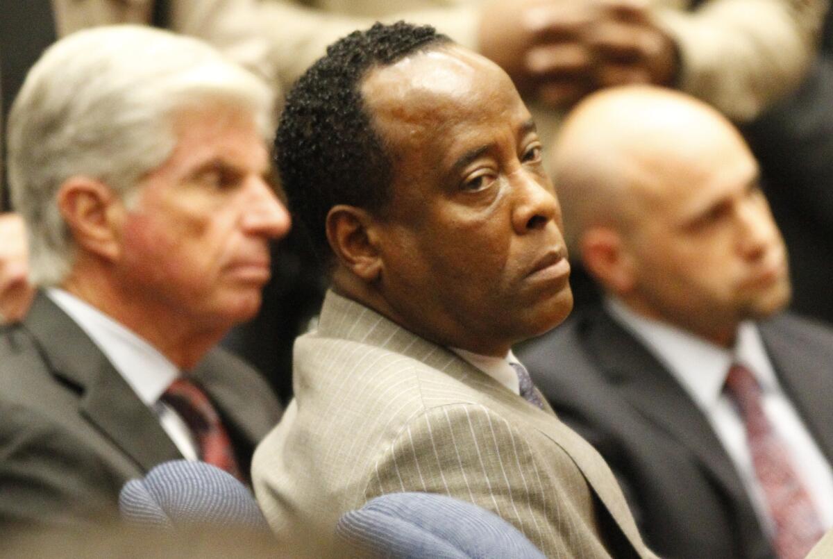 Dr. Conrad Murray sits in court after the jury returned with a guilty verdict in his involuntary manslaughter trial in November 2011.