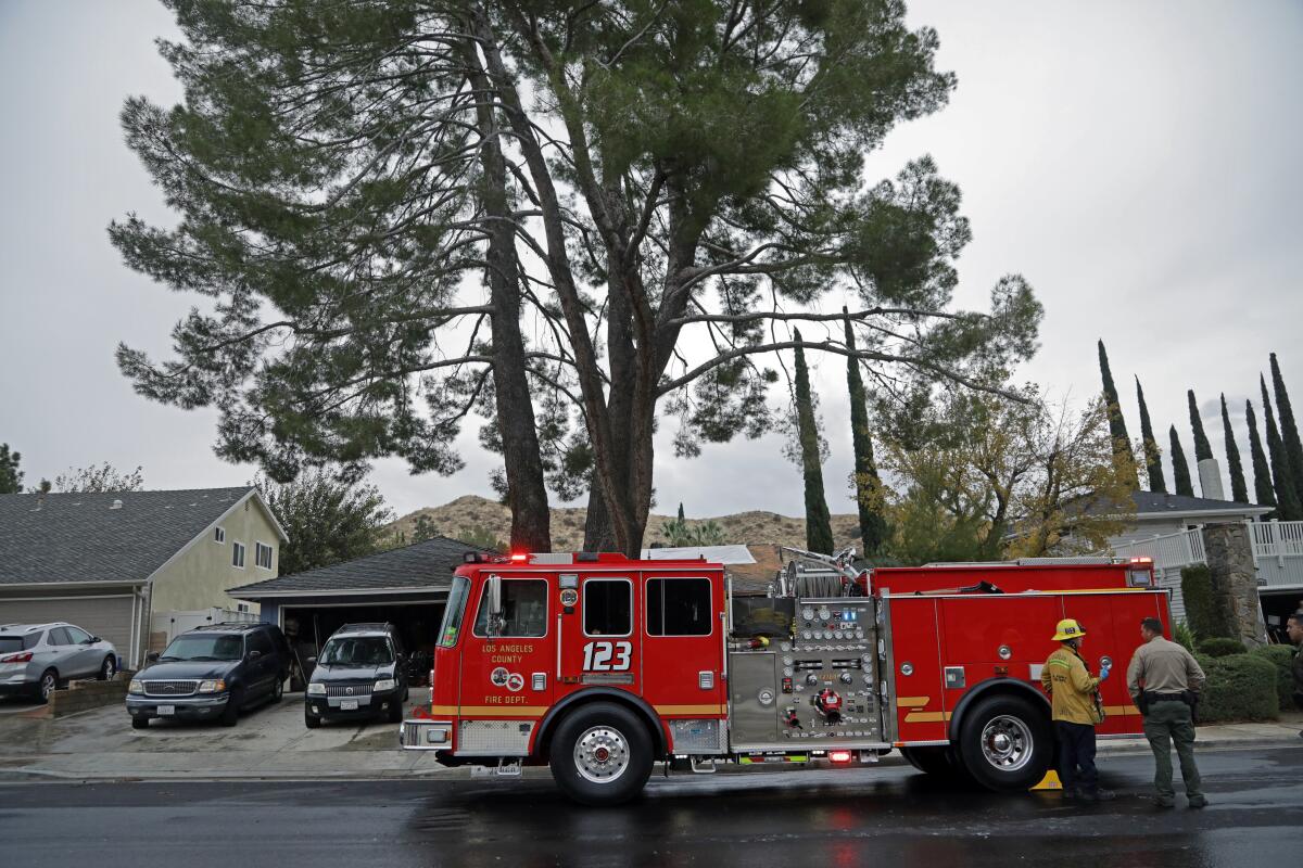 Firefighters respond to a house fire