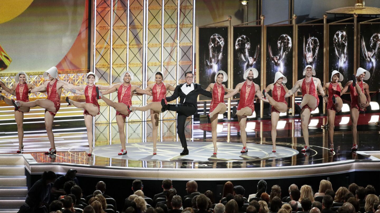 Host Stephen Colbert performs onstage during the 69th Emmy Awards.