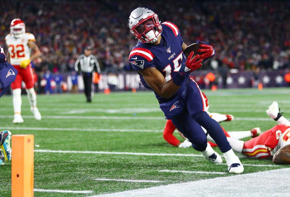 The Patriots' N'Keal Harry was ruled out of bounds as he ran toward the end zone during the fourth quarter against the Chiefs on Sunday.