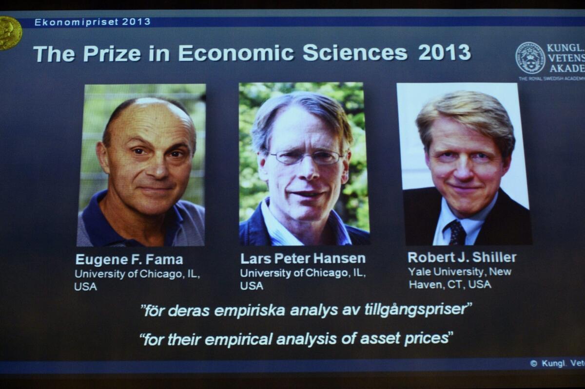 Pictures of the 2013 Nobel laureates in economic sciences -- Eugene Fama, Lars Peter Hansen and Robert Shiller, left to right -- are displayed on a screen during a news conference at the Royal Swedish Academy of Sciences in Stockholm.