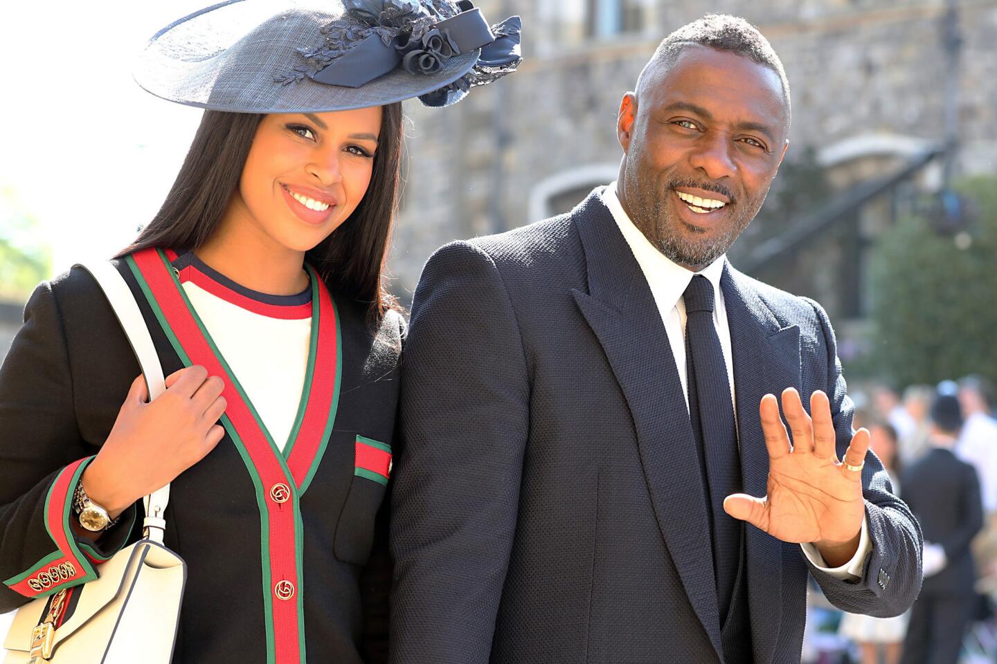 Idris Elba and Sabrina Dhowre arrive for the wedding of Prince Harry and Meghan Markle.