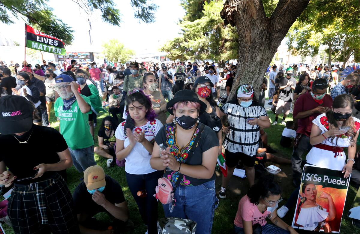 Hundreds of people gather at Ruben Salazar Park in Los Angeles