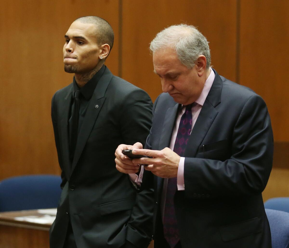 Chris Brown appears with his attorney, Mark Geragos, in Los Angeles County court.