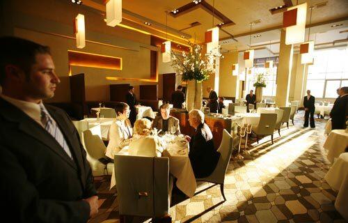 Sunlight streams into the dining room at Restaurant Charlie, chef Charlie Trotter's new endeavor, at the Palazzo Resort-Hotel-Casino in Las Vegas.