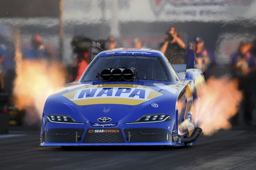 In this photo provided by the NHRA, Ron Capps drives in Funny Car qualifying for the Summit Racing Equipment NHRA Nationals drag races Friday, June 24, 2022, at Summit Racing Equipment Motorsports Park in Norwalk, Ohio. (Marc Gewertz/NHRA via AP)