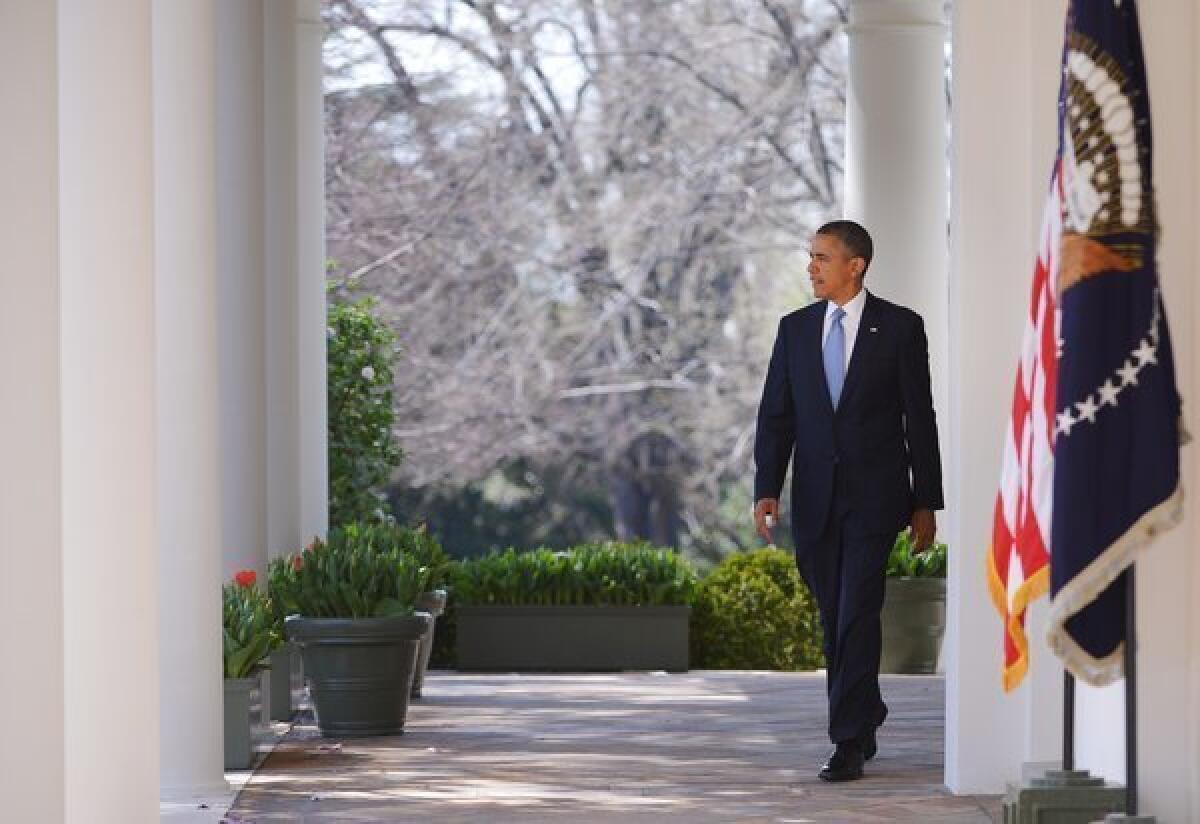 President Obama makes his way to the White House Rose Garden to speak on the budget.