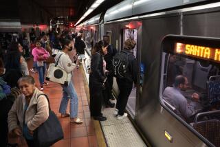 LOS ANGELES, CALIFORNIA May 15, 2024-Passengers prepare to ride the Metro Red Line in Los Angeles Wednesday. (Wally Skalij/Los Angeles Times)