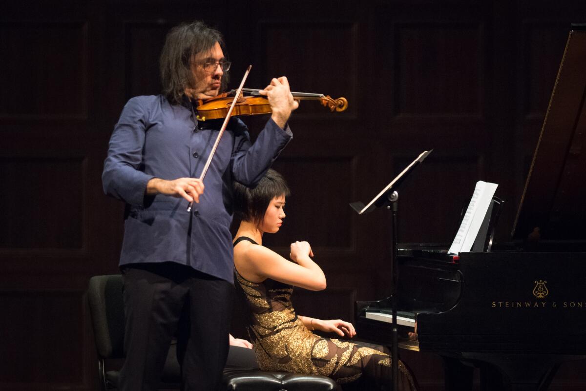 Violinist Leonidas Kavakos and pianist Yuja Wang perform Schubert's Fantasie in C Major at the Granada Theatre in Santa Barbara on Monday night.