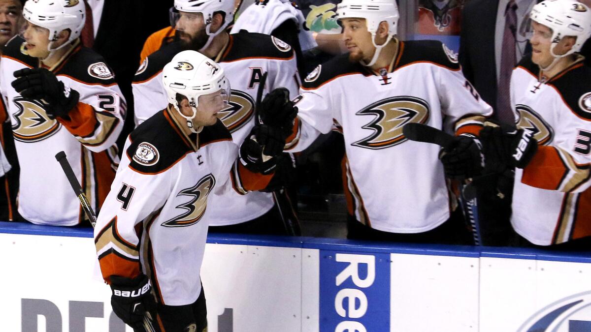 Ducks defenseman Cam Fowler (4) is congratulated by teammates after scoring against the Panthers in the second period Thursday.