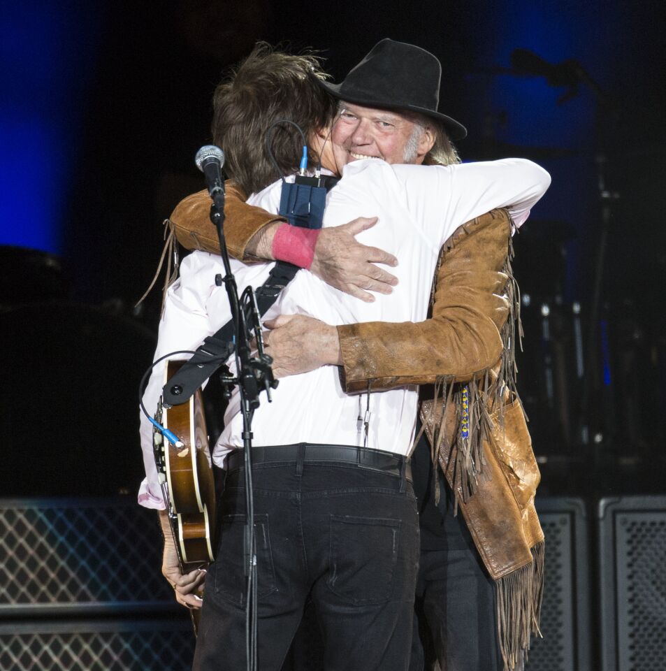 Neil Young and Paul McCartney on stage at Desert Trip on Saturday at the Empire Polo Club grounds in Indio.