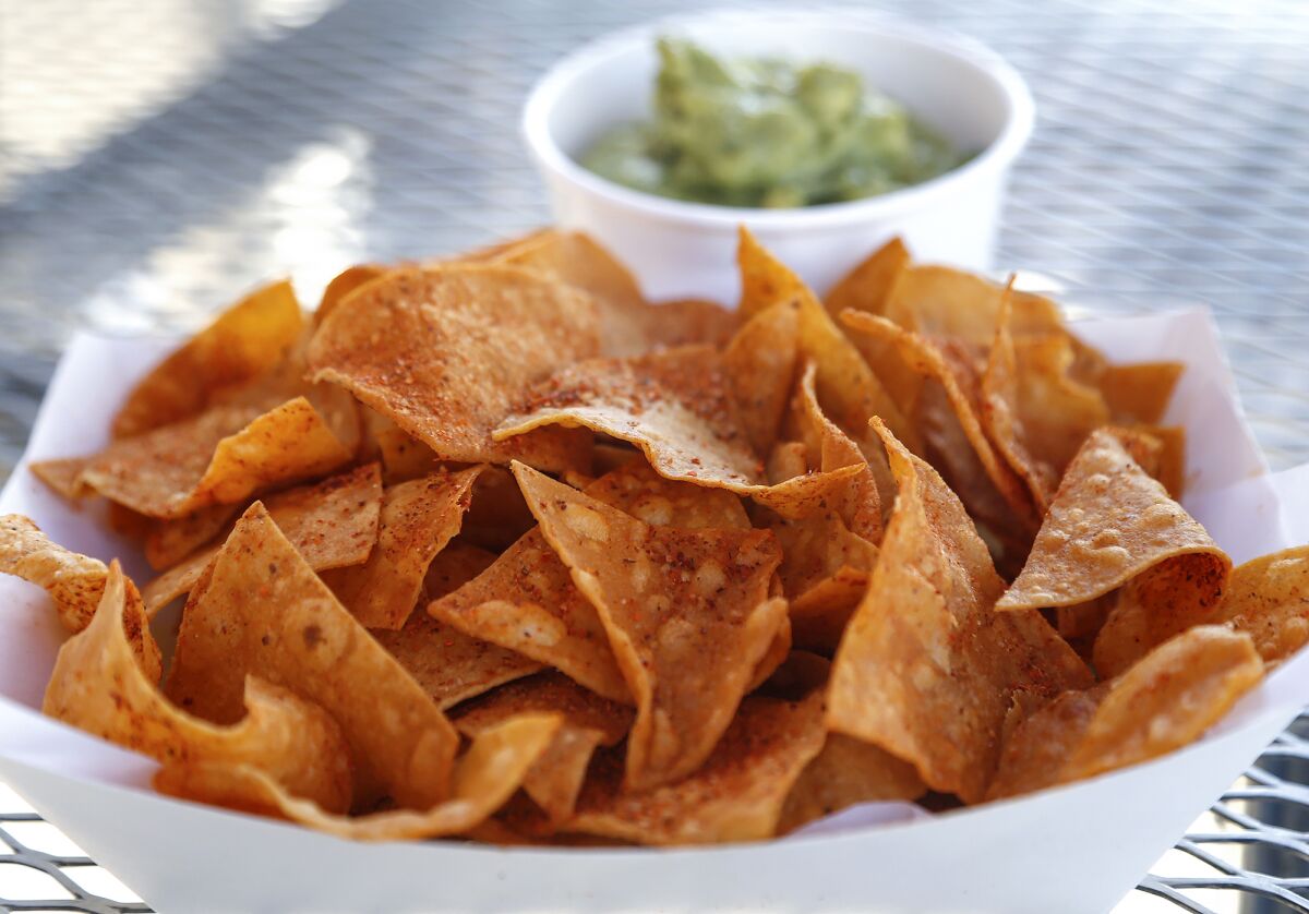 Chips and guacamole are a popular choice at Tustin's new Taco Mesita.