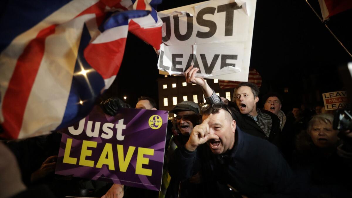Demonstrators who favor Britain leaving the European Union outside Parliament on March 14.