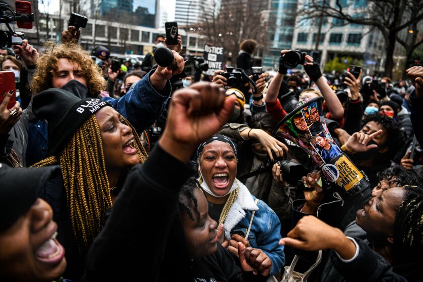 People celebrate as the verdict is announced in the trial of former police officer Derek Chauvin outside the Hennepin County Government Center in Minneapolis, Minnesota on April 20, 2021. - Sacked police officer Derek Chauvin was convicted of murder and manslaughter on april 20 in the death of African-American George Floyd in a case that roiled the United States for almost a year, laying bare deep racial divisions. (Photo by CHANDAN KHANNA / AFP) (Photo by CHANDAN KHANNA/AFP via Getty Images)