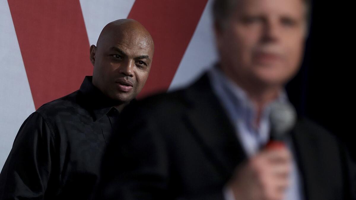 NBA Hall of Famer Charles Barkley, left, campaigns with Democratic Senate candidate Doug Jones at a get-out-the-vote rally in Birmingham, Ala.