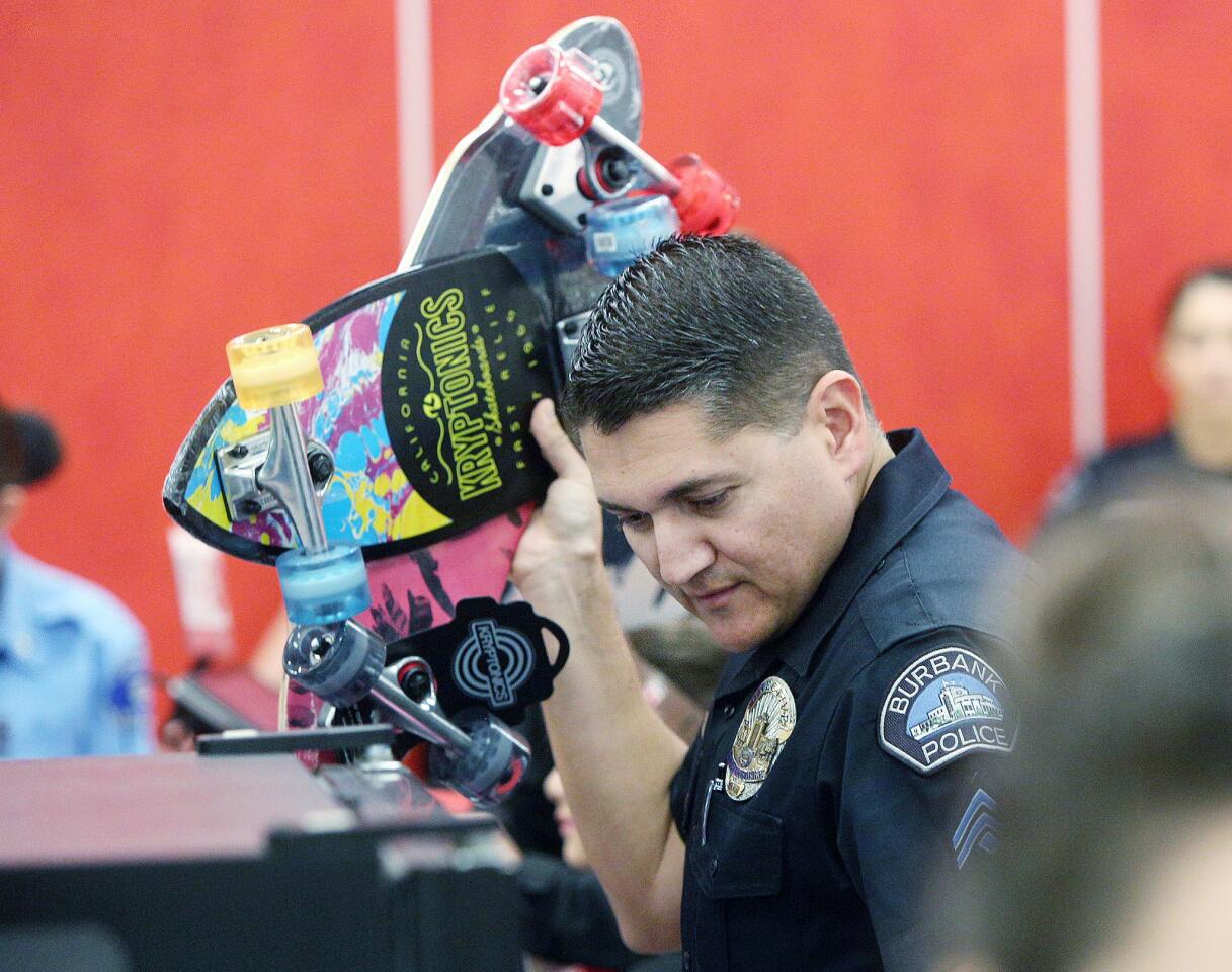 Photo Gallery: Burbank Boys and Girls Club children match up with Burbank Police Department for annual Heroes and Helpers event