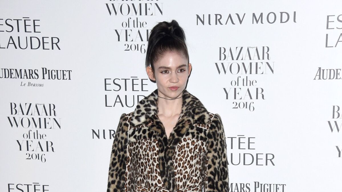 Grimes took to Instagram on Thursday to unveil her new digital avatar and casually drop some major personal news.