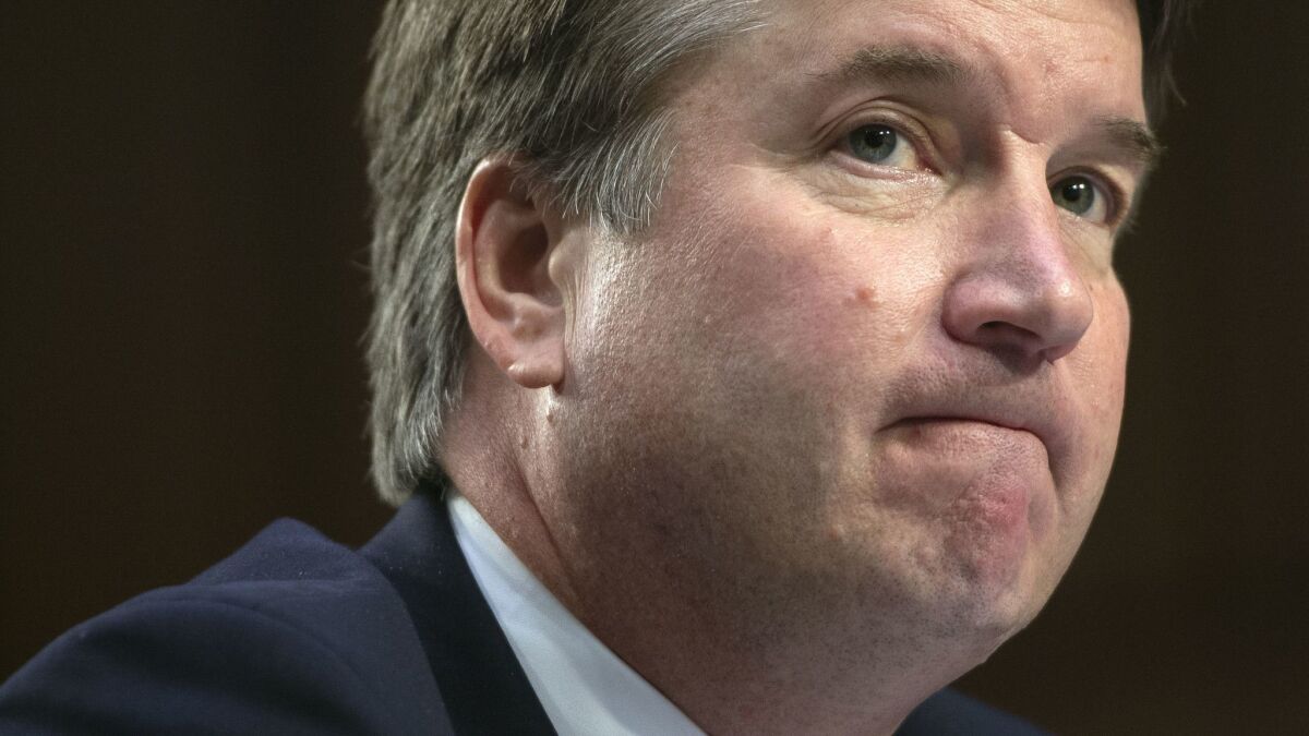 Judge Brett Kavanaugh testifies before the Senate Judiciary Committee during his confirmation hearing. He has denied allegations that he sexually assaulted a girl when they were both in high school.