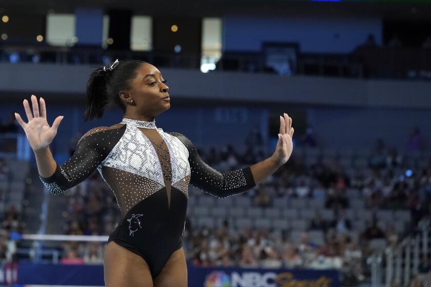 Simone Biles competes in the floor exercise during the U.S. Gymnastics Championships, Sunday, June 6, 2021, in Fort Worth, Texas. (AP Photo/Tony Gutierrez)