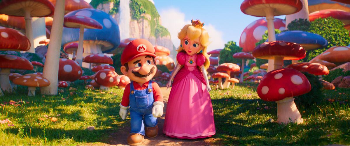 Mario (Chris Pratt) and Princess Peach (Anya Taylor-Joy) walk in "The Super Mario Bros. Movie."