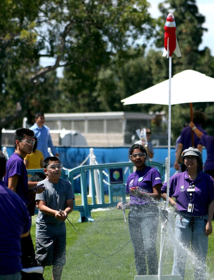 Photo Gallery: Soda bottle rockets launched during Discovery Cube event at Boeing