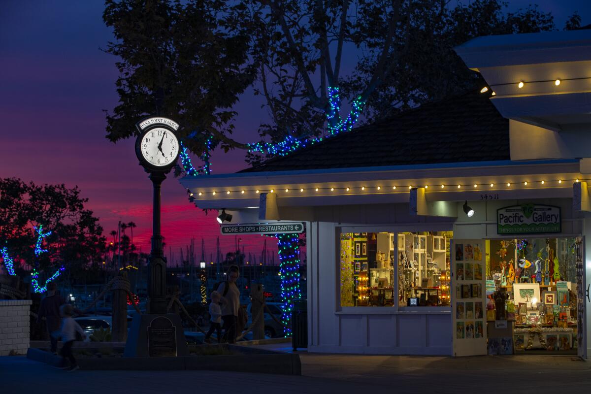 Sunsets, holiday lights and vintage beachfront shops in Dana Point Harbor