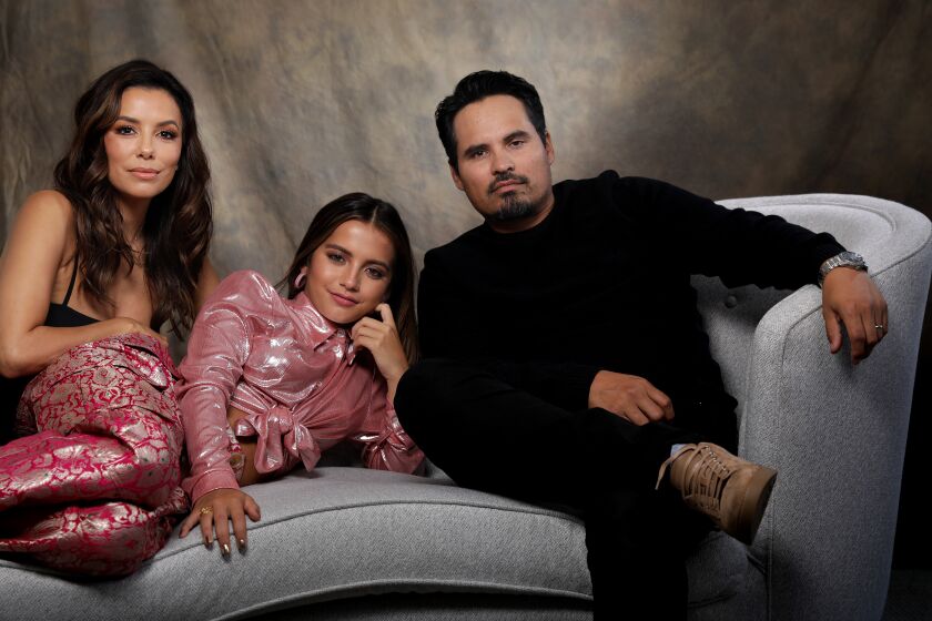 BEVERLY HILLS-CA-JULY 30, 2019: Eva Longoria, Isabela Moner, and Michael Peña, from left, are photographed for “Dora and the Lost City of Gold, “ live-action adaptation of the Nickelodeon show at the Four Seasons Hotel in Beverly Hills on Tuesday, July 30, 2019. (Christina House / Los Angeles Times)