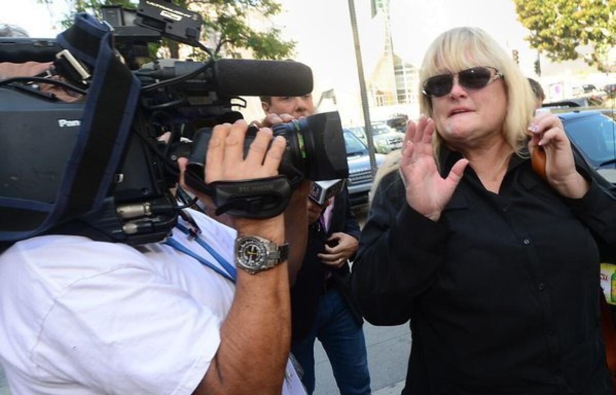 Michael Jackson's ex-wife Debbie Rowe arrives at court in Los Angeles on Thursday, in the ongoing trial of the wrongful-death lawsuit filed by the late singer's mother against concert promoter AEG Live.
