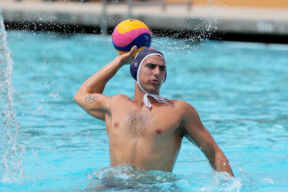 Luca Cupido shoots the ball during practice for the U.S. Olympic men's water polo team on July 8 at Sage Hill School.