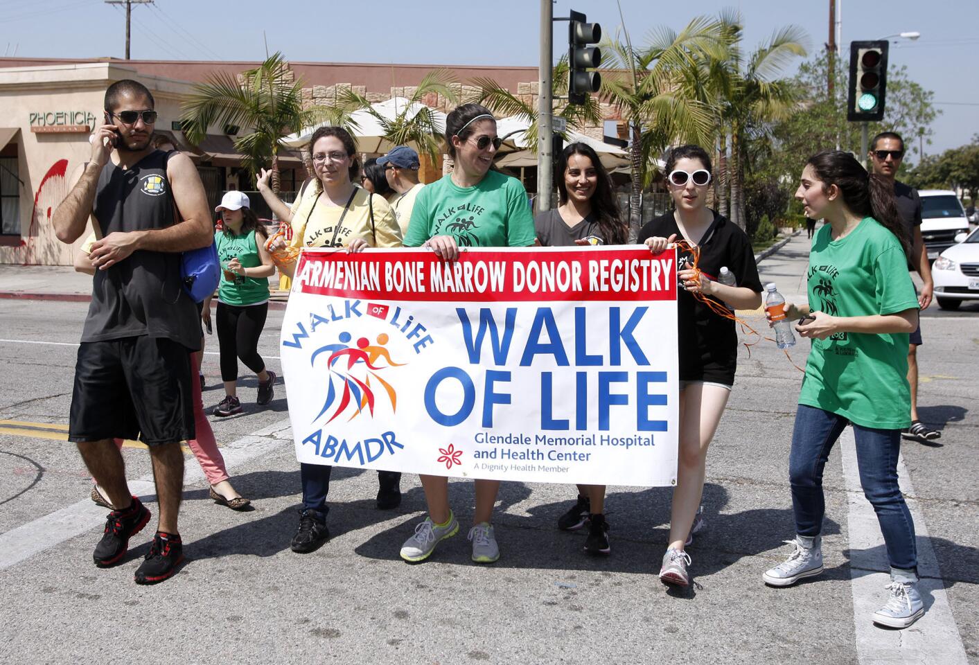 A group of walkers carried an official sign in the Armenian Bone Marrow Donor Registry Annual Walk of Life walk-a-thon in Glendale on Saturday, May 4, 2013. Participants began their walk at Glendale Memorial Hospital, walked north on Central Ave., west on Lexington to Brand Blvd. and back south to the hospital.