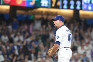 Los Angeles, California August 29, 2024-Dodgers pitcher Blake Treinen celebrates.