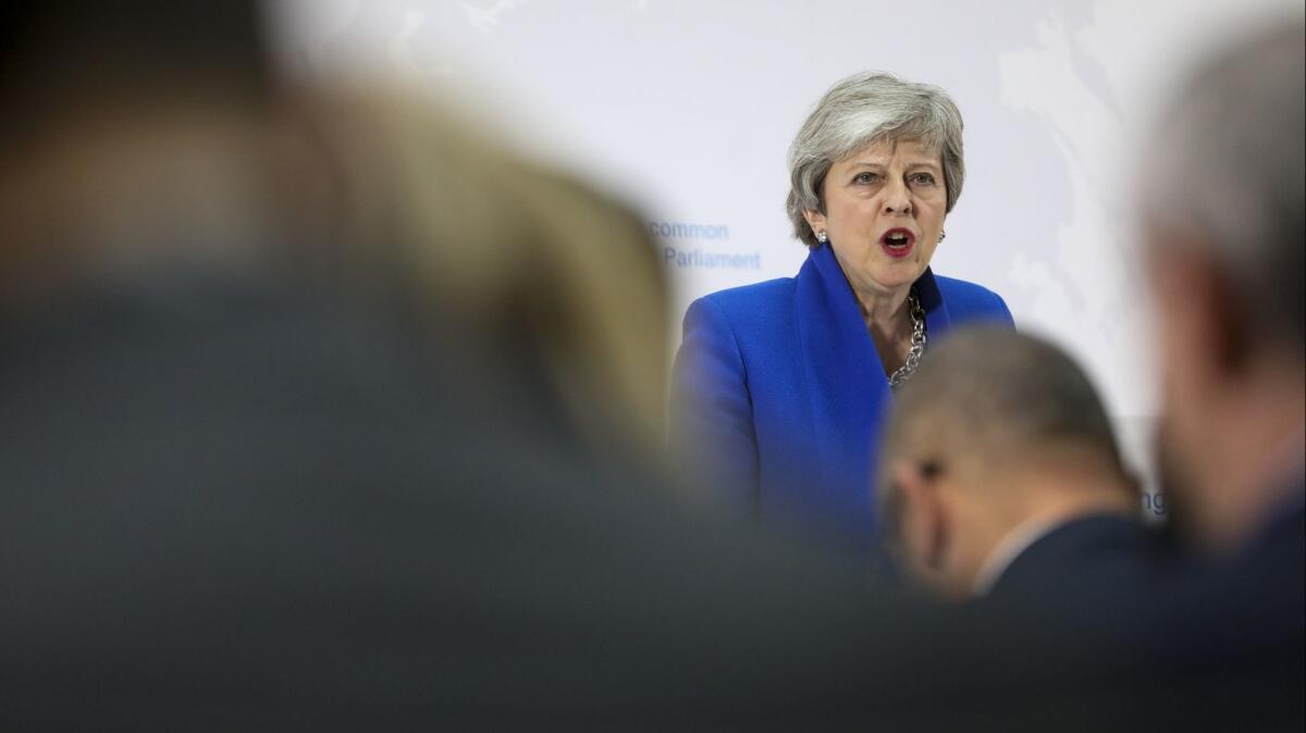 British Prime Minister Theresa May delivers a speech setting out a new proposal for her Brexit deal in London.