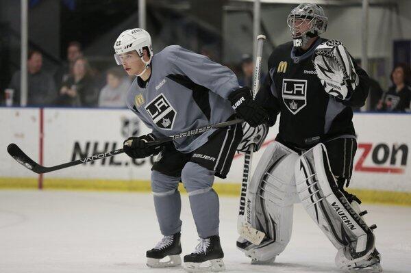 Kings stars Dustin Brown, left, and goalie Jonathan Quick participate in drills during the the team's first practice of the 2013 NHL season at the Toyota Sports Complex.