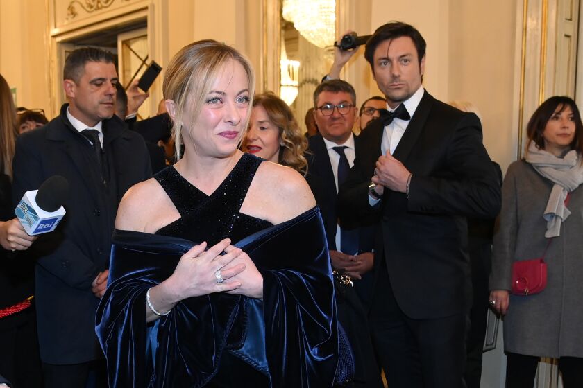 Italian Premier Giorgia Meloni arrives to attend La Scala’s gala premiere in Milan, Wednesday Dec. 7, 2022. Italy’s most famous opera house, Teatro alla Scala, opens its new season Wednesday with the Russian opera “Boris Godunov,” a selection that sparked Ukrainian protests of the cultural event serving as a propaganda win for the Kremlin against the backdrop of Russia’s invasion of Ukraine. (Gian Mattia D'Alberto/LaPresse via AP)