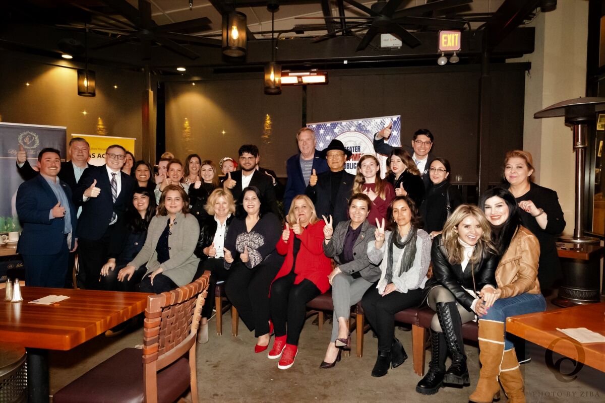 Henny Abraham, fourth from left in front, held a March 23 fundraiser in Newport Beach as part of her 2024 assembly campaign.