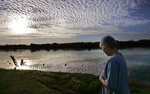 Janet Keener, a 12-year resident of the Colorado River Communities, takes her daily walk along the river bank. The remote area is the last outpost of the Inland Empire and many people thrive here, taking refuge in the water and the solitude. You either love it here or hate it, there is no middle ground, says Keener, chairwoman of the board of directors of the Colorado River Senior Center in Hidden Valley.